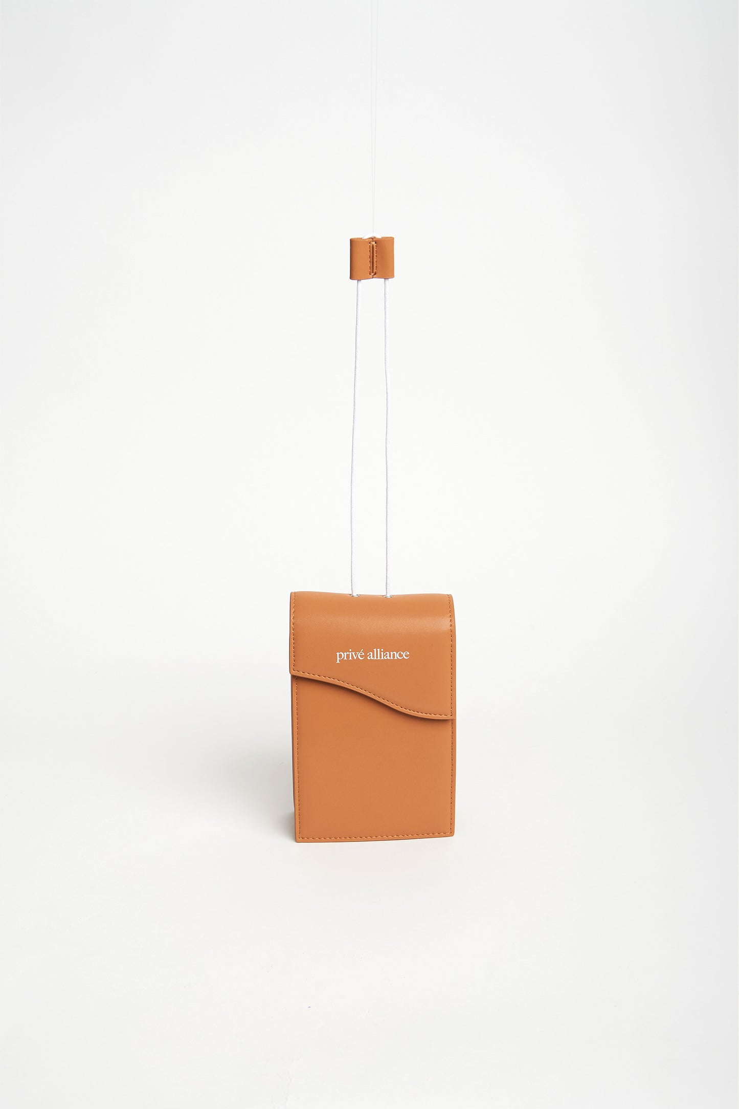 NECESSITY POUCH BAG - CAMEL