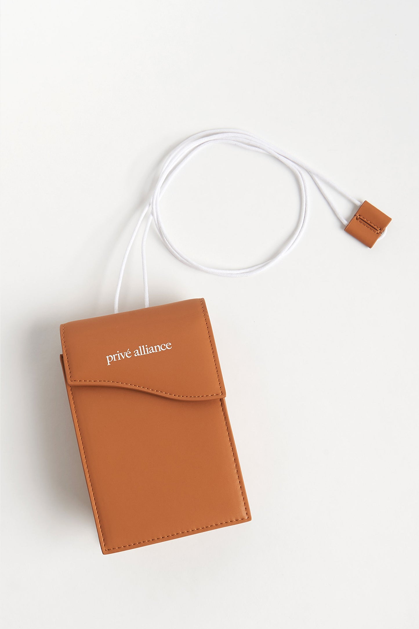 NECESSITY POUCH BAG - CAMEL