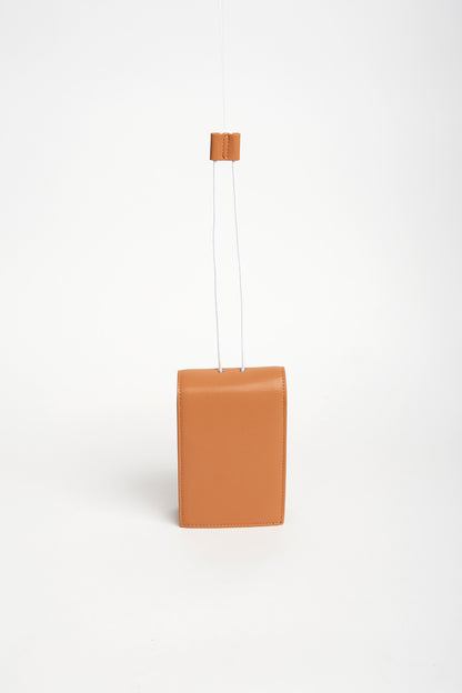NECESSITY POUCH BAG - CAMEL