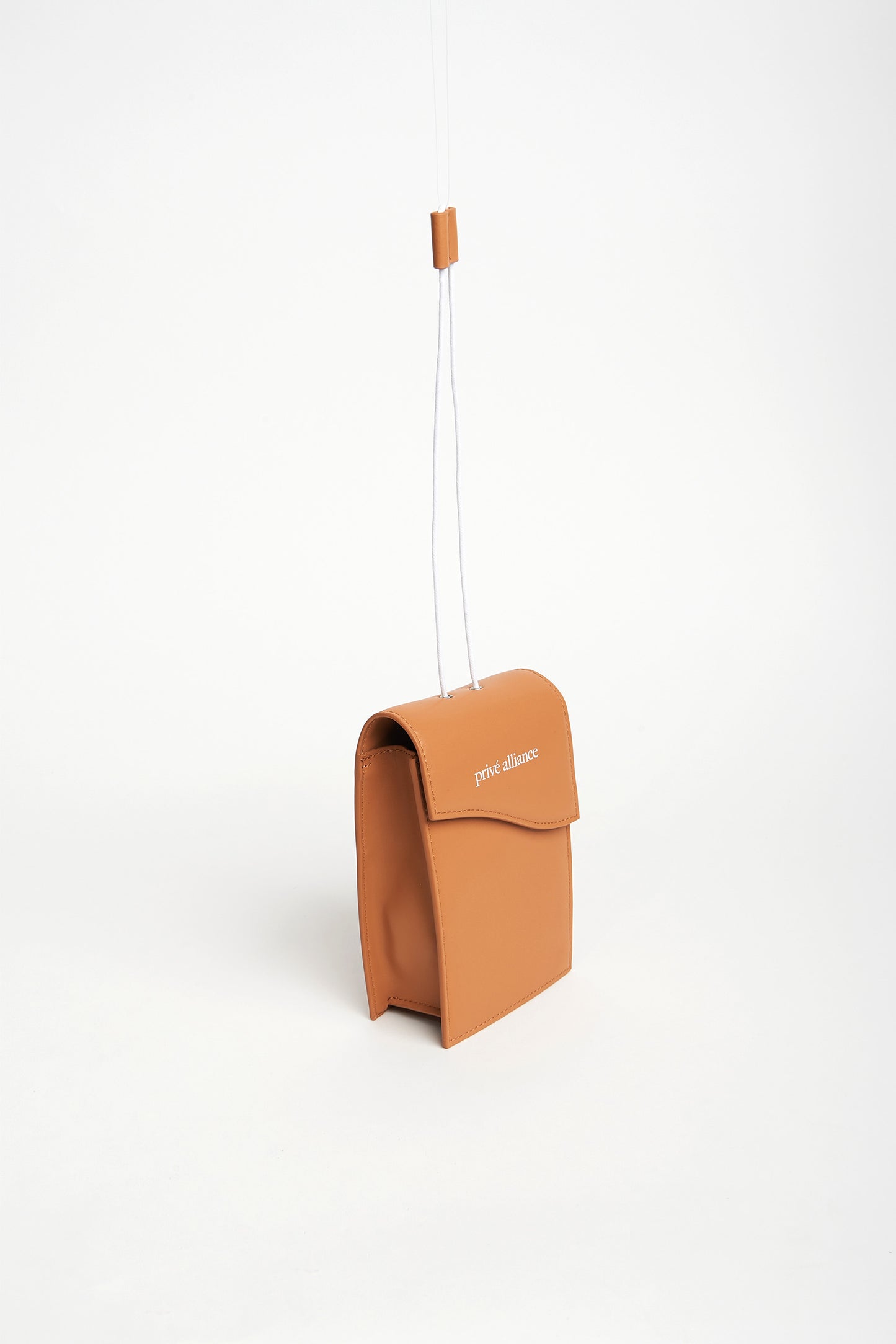 NECESSITY POUCH BAG - CAMEL